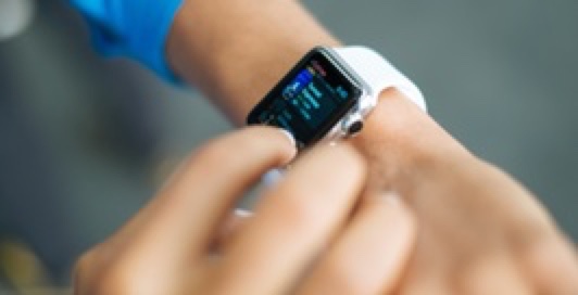 smartwatch on boy's arm